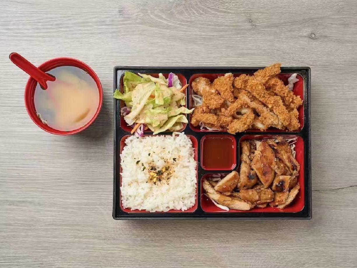 Assorted box with fried chicken, grilled chicken, rice and salad at Kiwami Ramen & Sushi, a Japanese Restaurant in Overland Park
