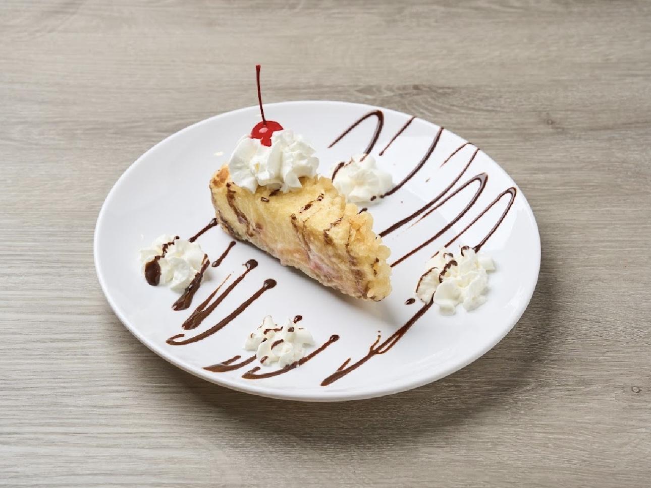 Fried cheese cake served with whipped cream and chocolate drizzle at Kiwami Ramen & Sushi, a Japanese Restaurant in Overland Park