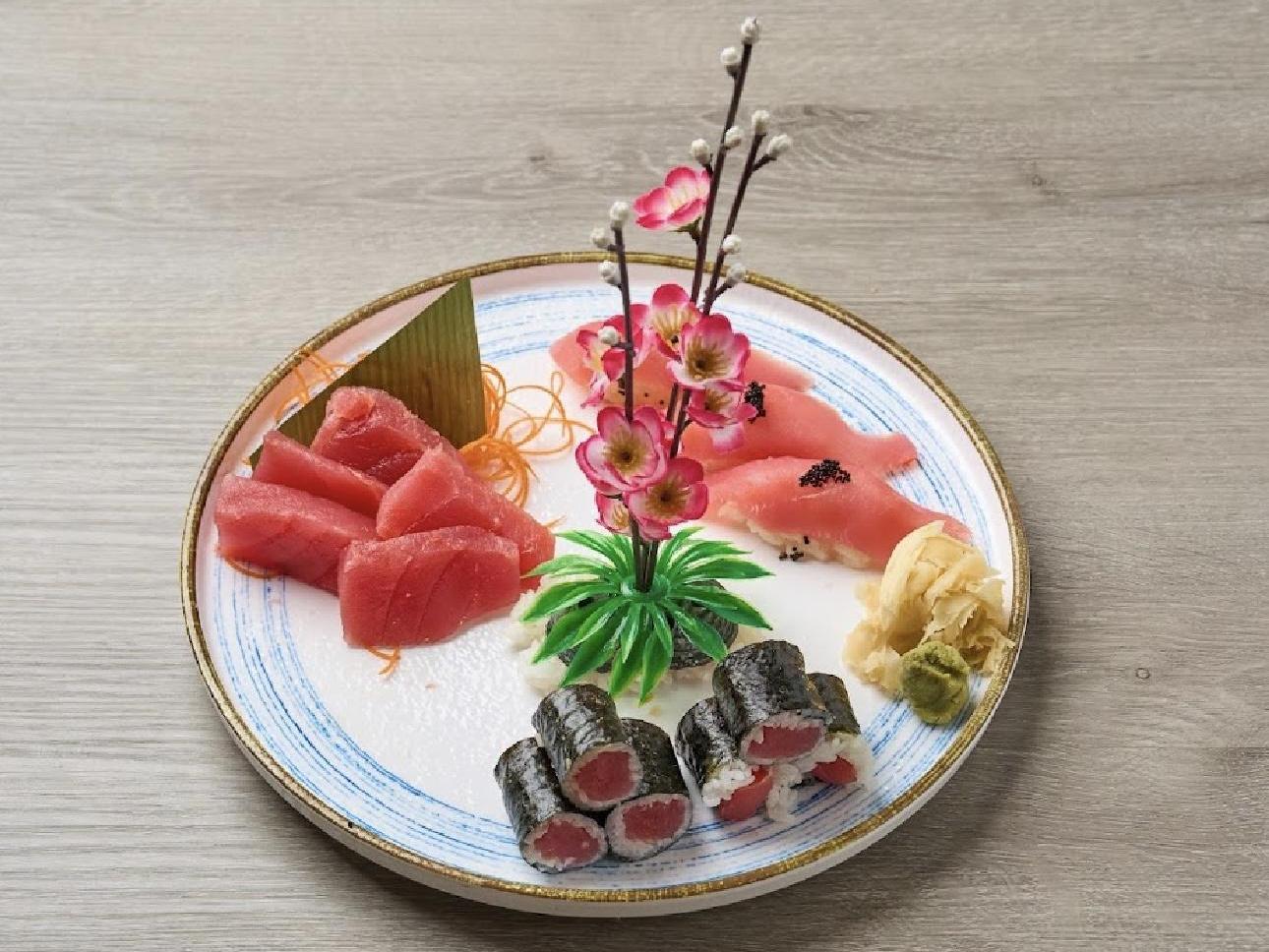 Tuna sashimi and tuna sushi served on a decorated plate at Kiwami Ramen & Sushi, a Japanese Restaurant in Overland Park