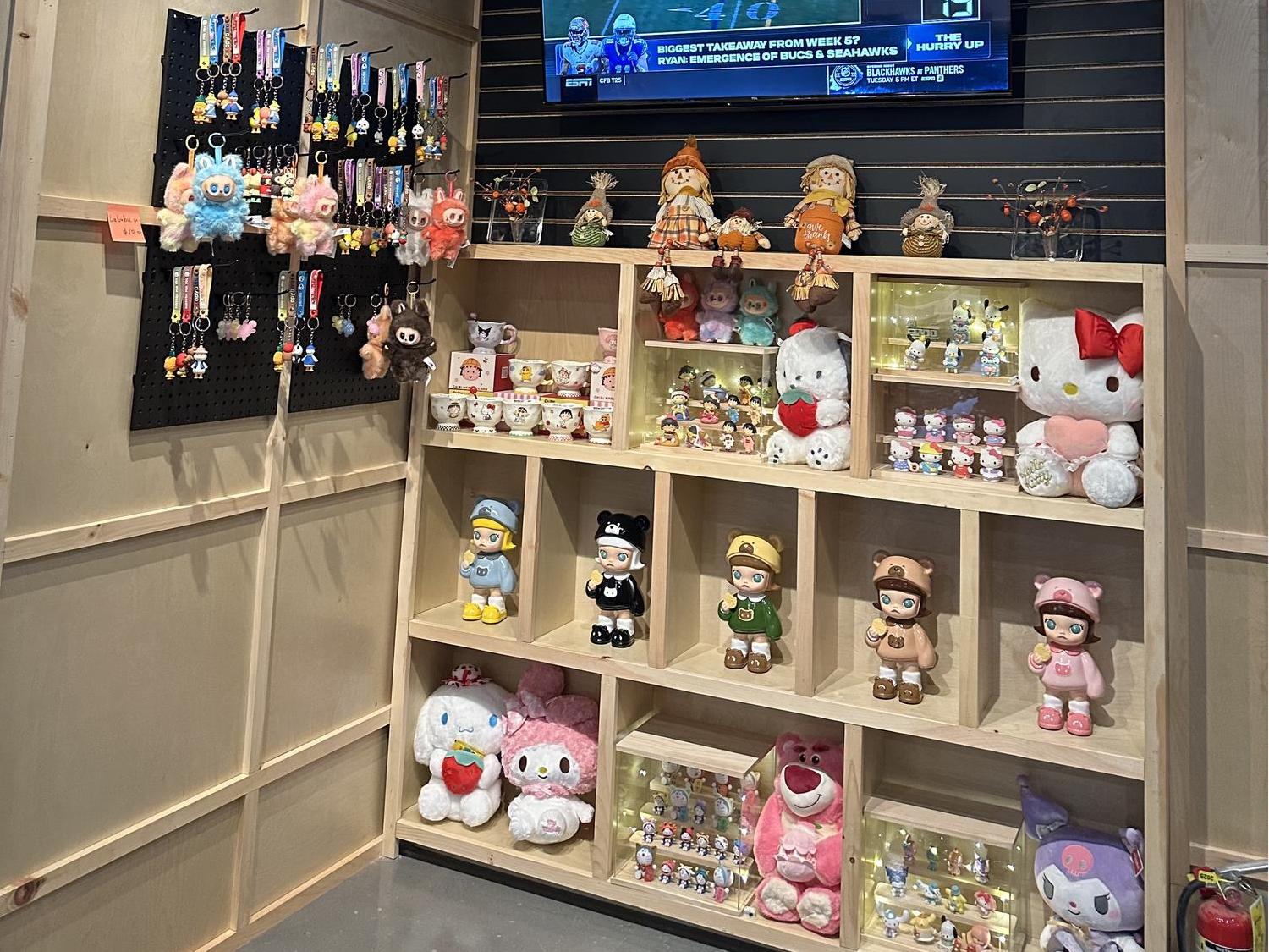 Shelves with plush toys, keychains and figurines for sale at Kiwami Ramen & Sushi, a Japanese Restaurant in Overland Park