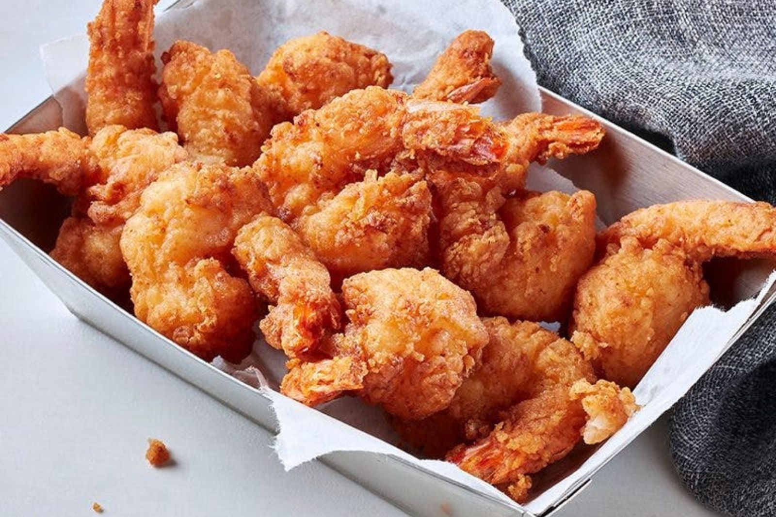 Golden crispy fried shrimp with crispy coating at Krispy Krunchy Chicken - Halal, a Fast - Food in Richardson