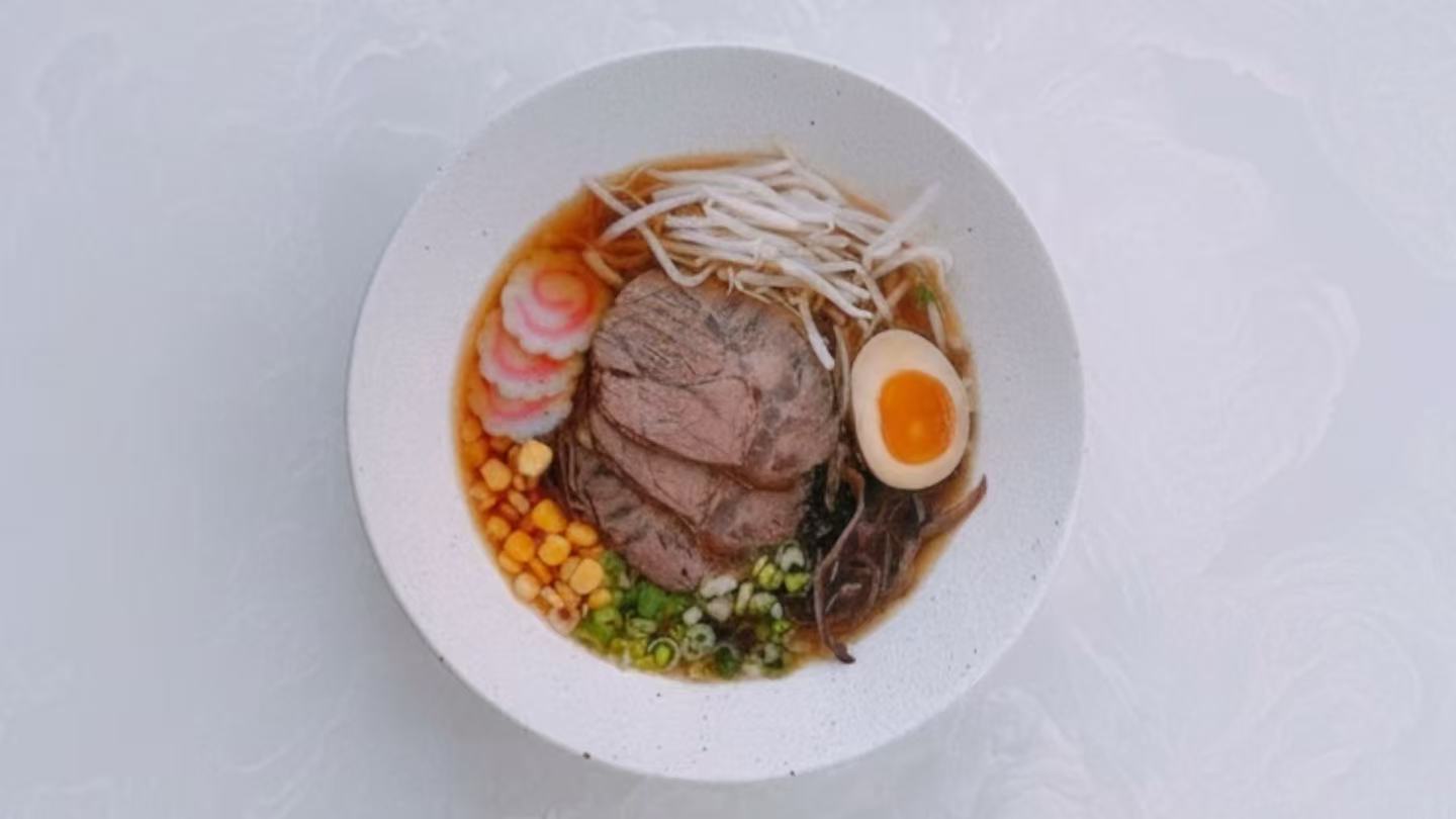 Knock-Knock-Asian-Restaurant-Korean-Beef-Ramen-Staten-Island Ramen with tender beef slices and soft-boiled egg at Knock Knock, an Asian Restaurant in Staten Island
