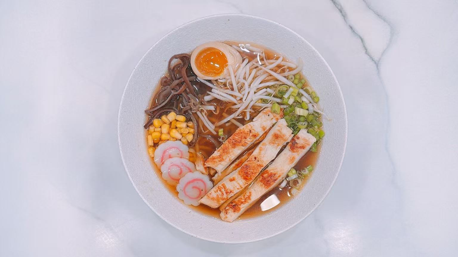 Ramen with pan-seared chicken strips at Knock Knock, an Asian Restaurant in Staten Island
