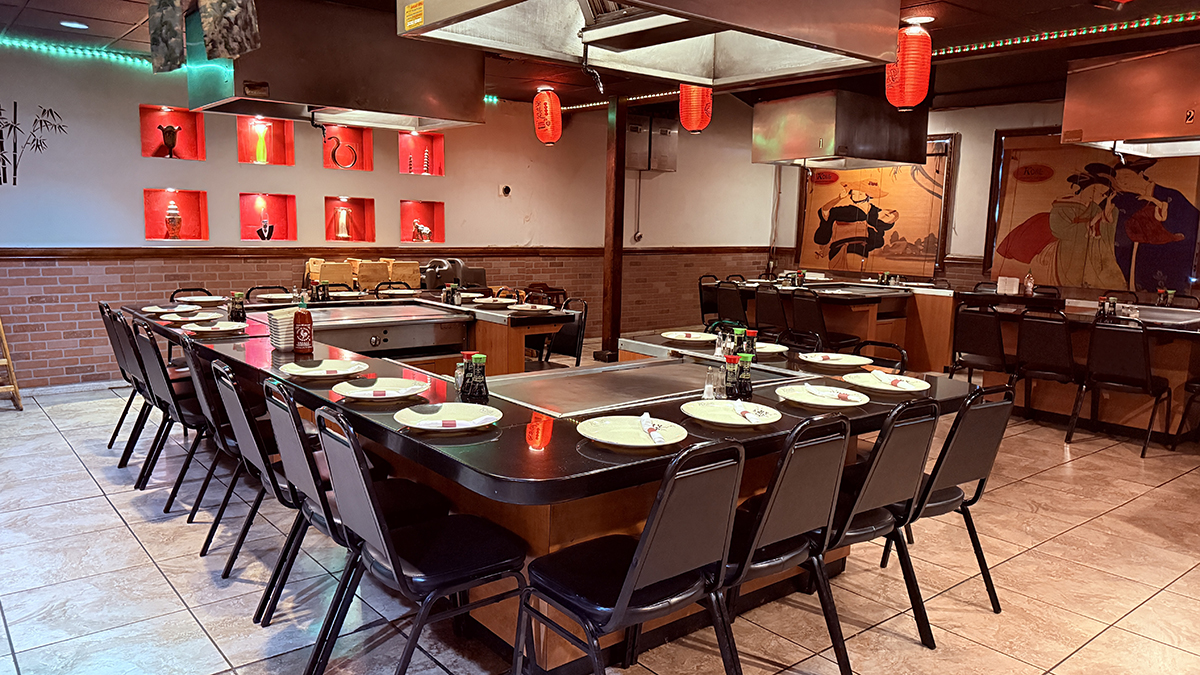 Kobe-Japanese-Steakhouse-Japanese-Restaurant-Interior-San-Antonio Interior of a Japanese teppanyaki restaurant with grills and dining setups