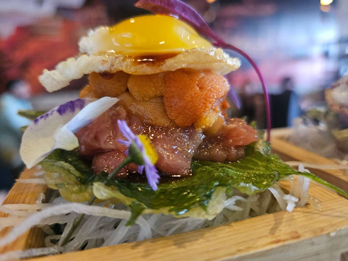 Rich uni and tuna stacked sushi bite at KoBu, a Japanese Sushi & Omakase Restaurant in Jacksonville