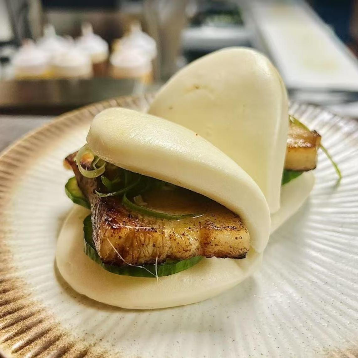 Fish Cake Bao Buns - Soft bao buns filled with grilled fish cake and cucumber at Koi Ramen & Sushi, a Japanese Restaurant in Grand Junction