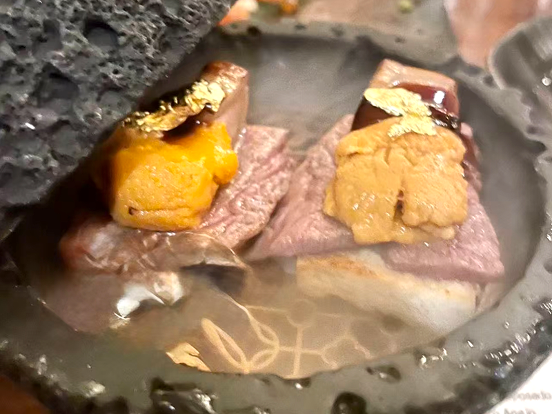 Seared A5 wagyu topped with uni & edible gold leaf at Koi Sushi, a Japanese Restaurant in Gaithersburg