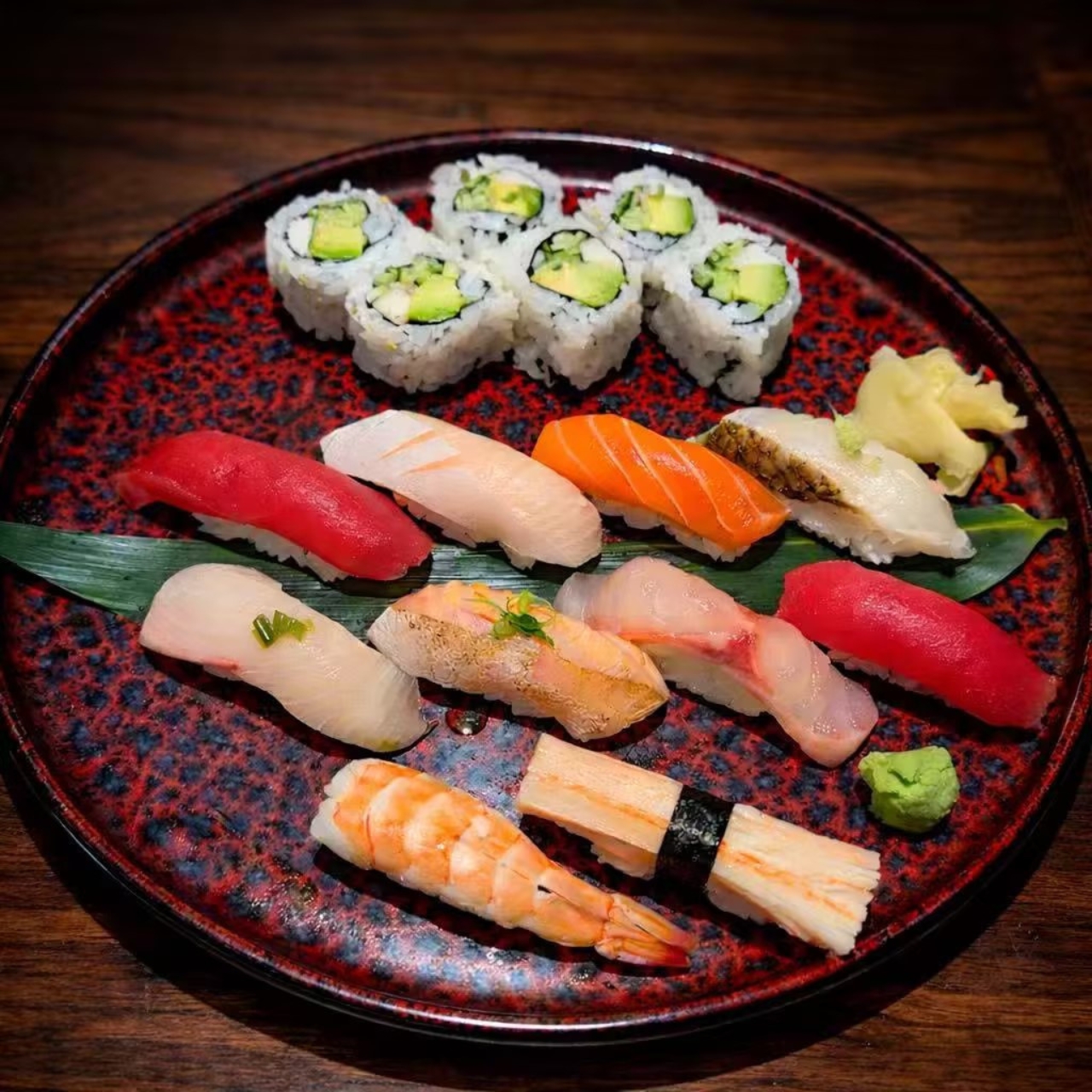 Assorted nigiri sushi and avocado maki roll at KOJO Asian Fusion, a Asian Fusion Restaurant in Franklin