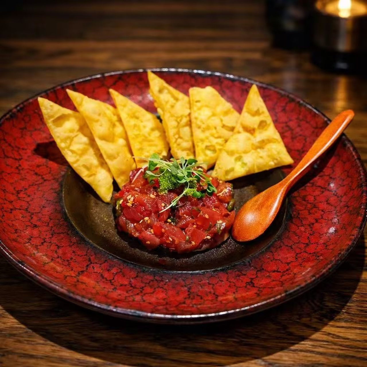 Tuna tartare with fresh herbs and crispy tortilla chips at KOJO Asian Fusion, a Asian Fusion Restaurant in Franklin