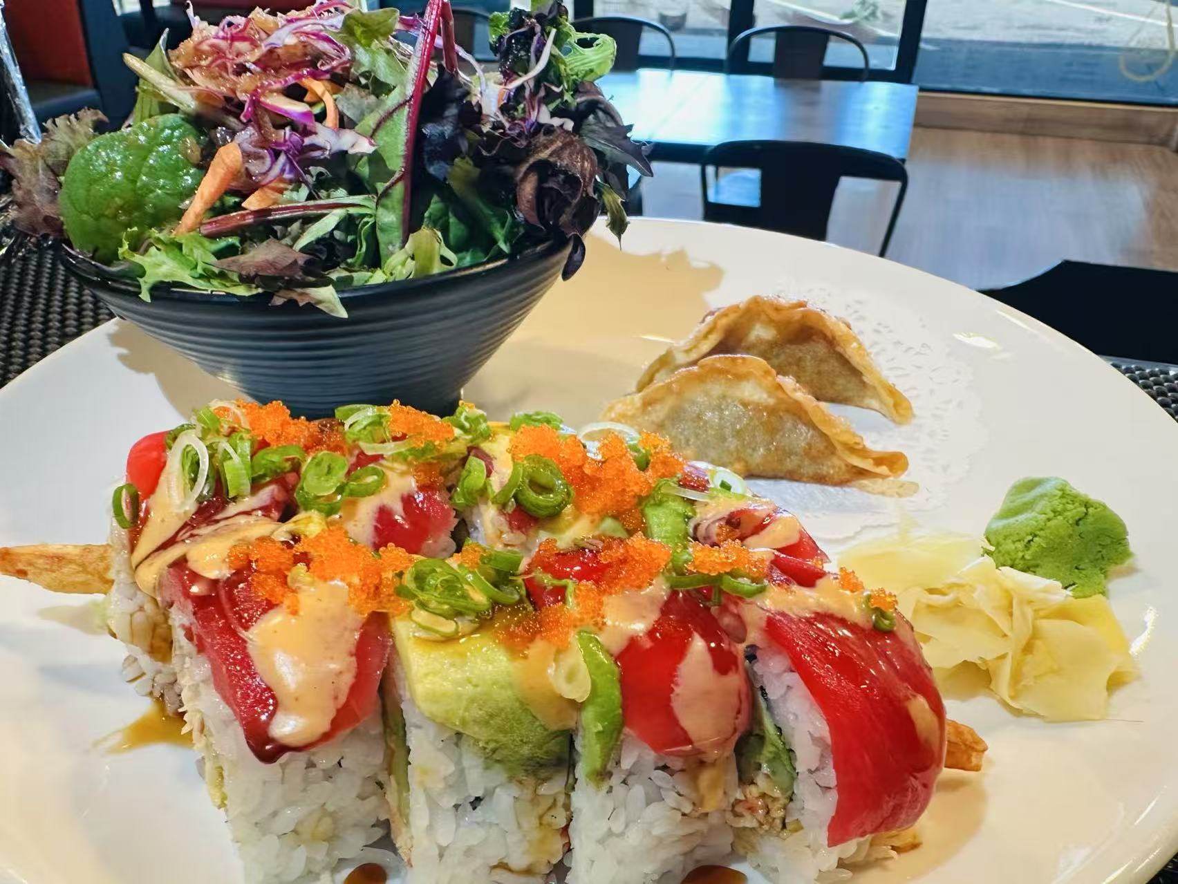 Roll Combo Special - Sushi rolls with salad and dumplings at Kokodeck Sushi, a Japanese restaurant in Anaheim