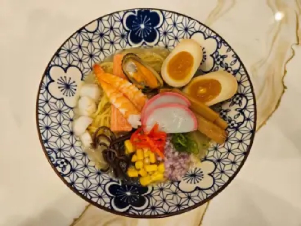 Mixed seafood loaded light broth ramen bowl at KOKORO House Of Ramen, a Ramen Restaurant in Glen Rock
