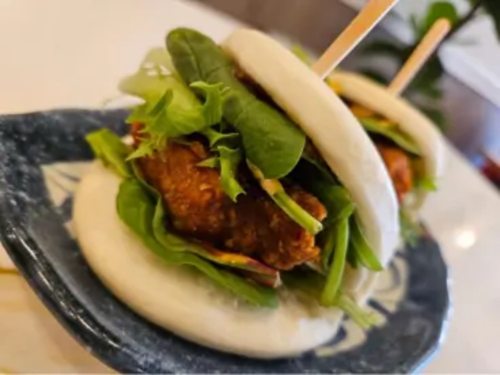 Savory fried meat filled bao buns at KOKORO House Of Ramen, a Ramen Restaurant in Glen Rock