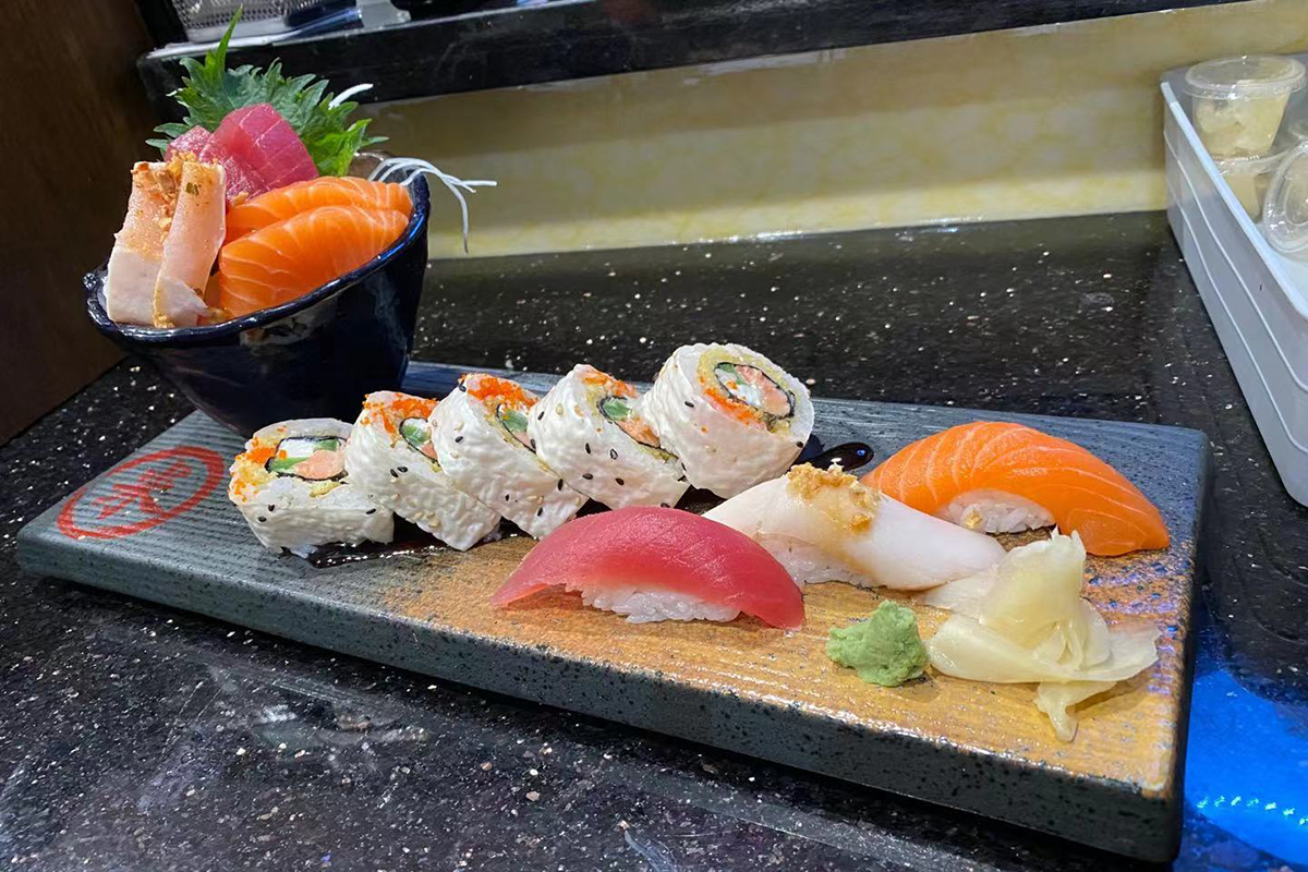 Premium assorted sashimi nigiri and sushi roll platter at Komeya Sushi & Ramen, a Japanese Restaurant in Spring