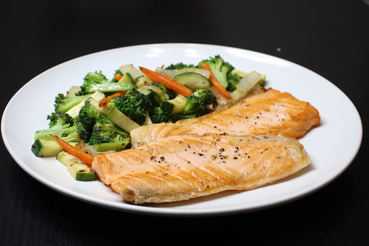 Pan seared salmon fillet with fresh stir fried vegetables at Komeya Sushi & Ramen, a Japanese Restaurant in Spring