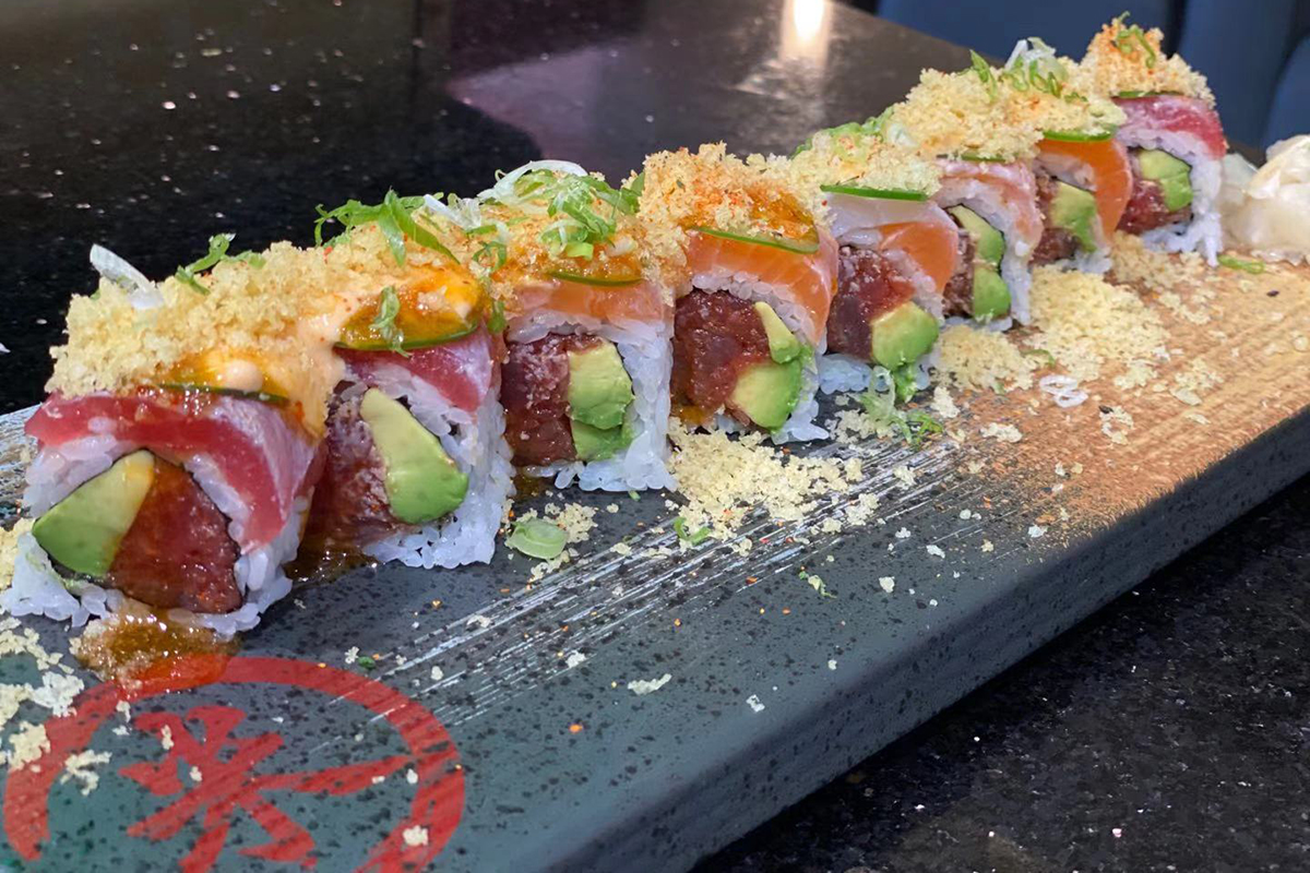 Tuna salmon avocado crunch topped signature sushi roll at Komeya Sushi & Ramen, a Japanese Restaurant in Spring