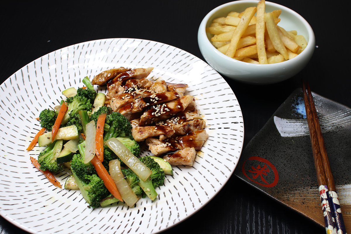 Teriyaki glazed grilled chicken with mixed veggies and side fries at Komeya Sushi & Ramen, a Japanese Restaurant in Spring