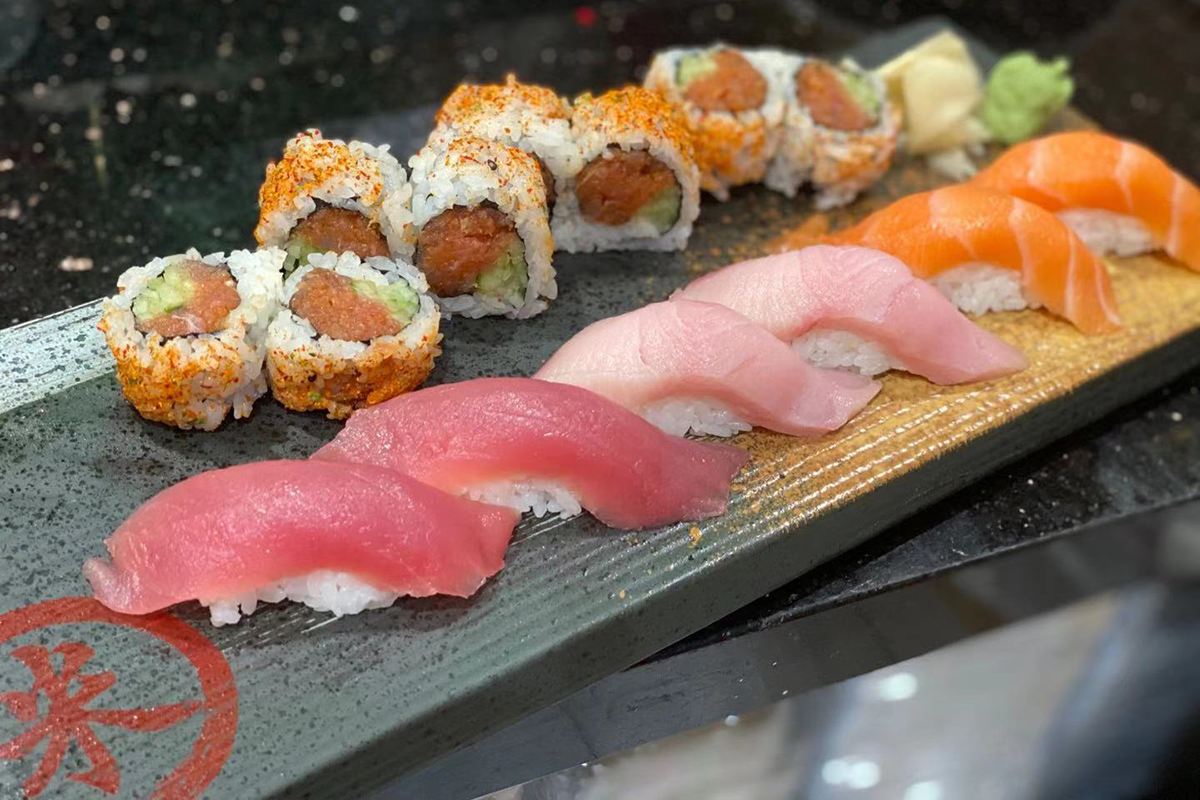Spicy tuna maki paired with fresh tuna salmon nigiri set at Komeya Sushi & Ramen, a Japanese Restaurant in Spring