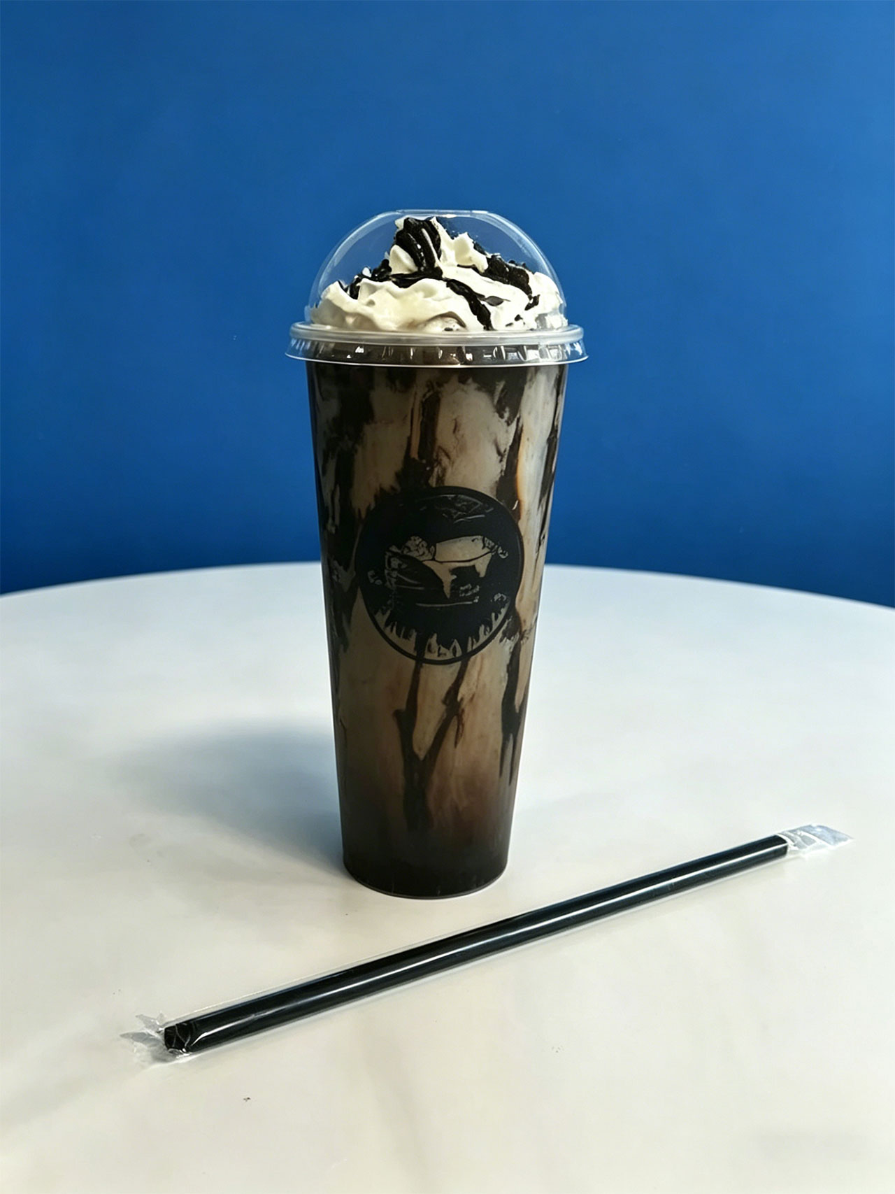 Oreo chocolate iced drink with whipped cream in a Kopiyo cup at Kopiyo, a Coffee shop in Flowood