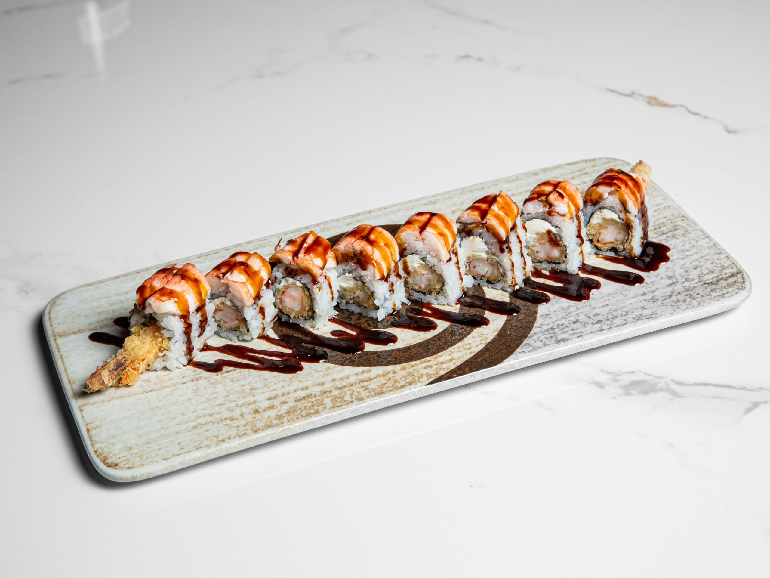 Sushi roll with double shrimp and spicy sauce at Kuchi, a Buffet Restaurant in Tampa