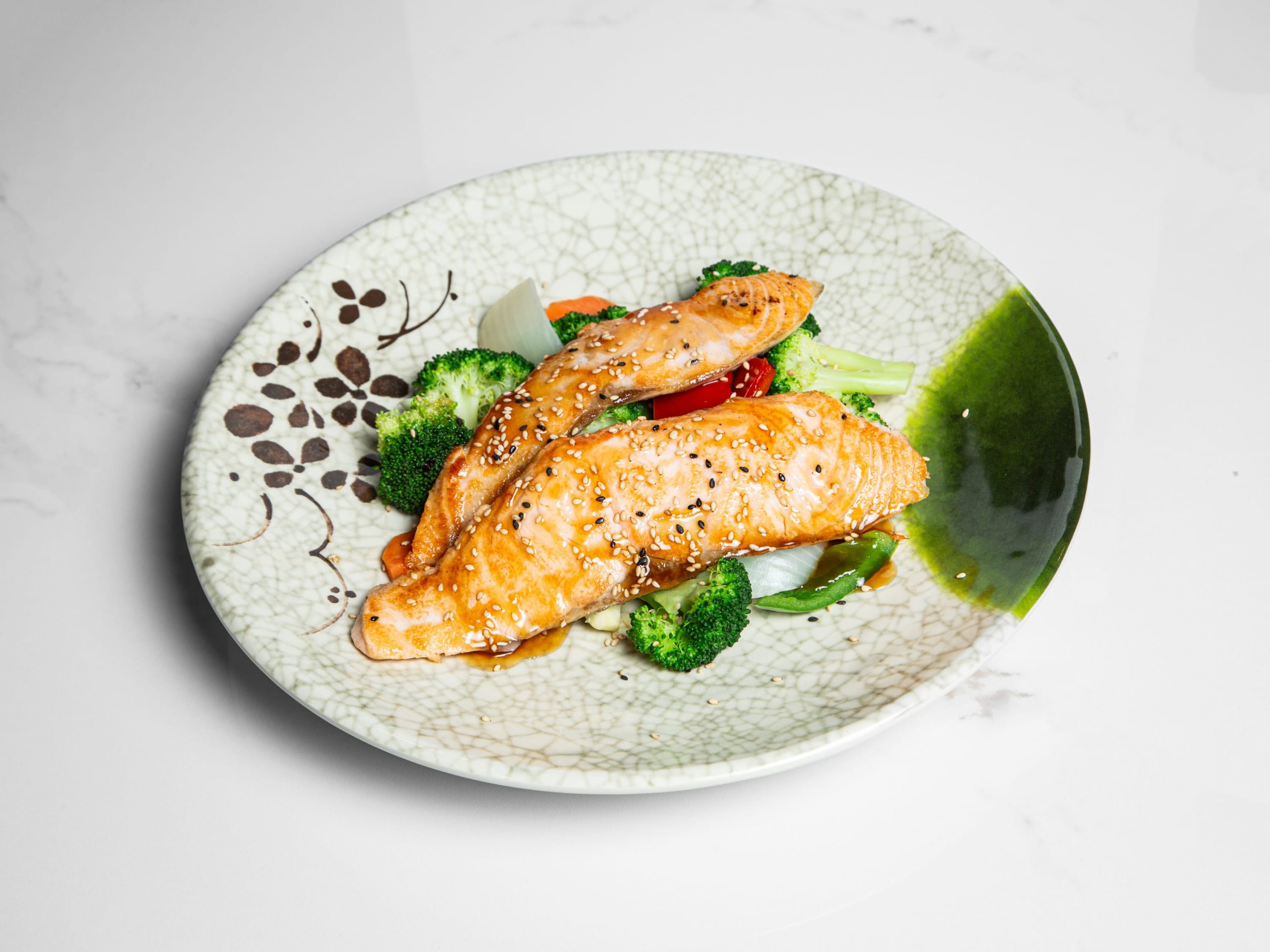 Grilled salmon with vegetables and lemon at Kuchi, a Buffet Restaurant in Tampa