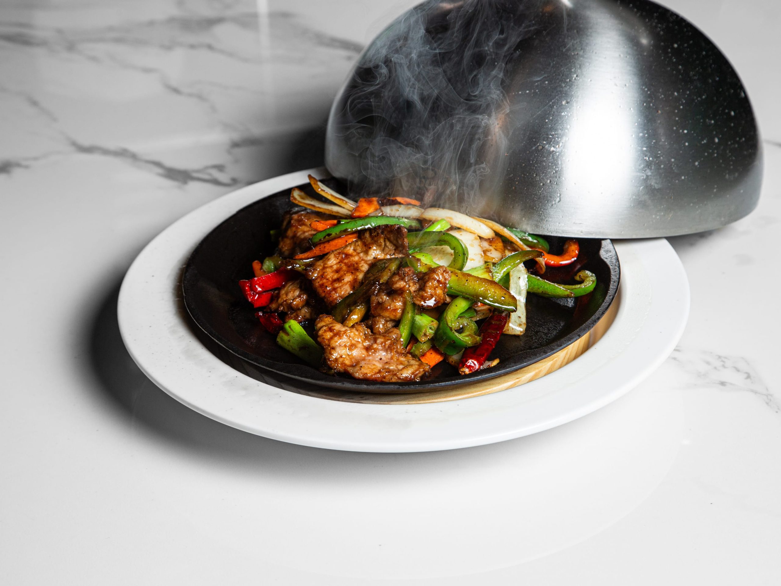 Grilled beef with black pepper and vegetables at Kuchi, a Buffet Restaurant in Tampa