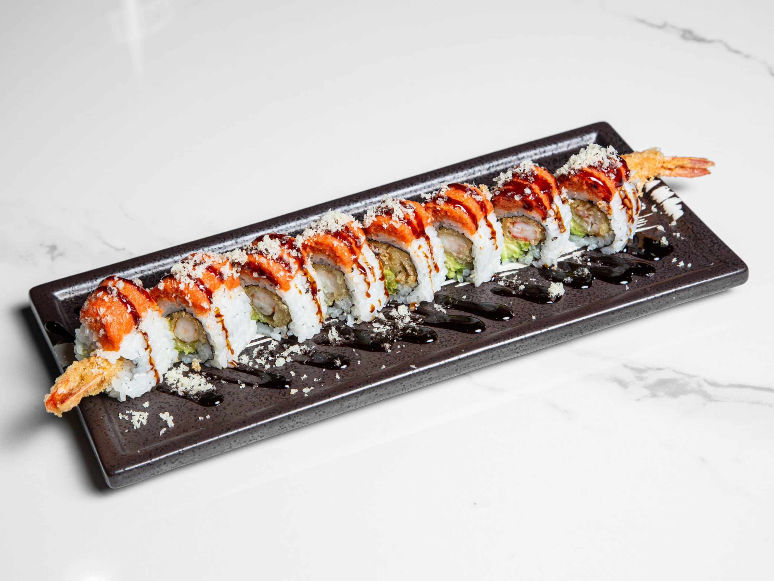 Baked sushi roll with spicy mayo and seafood at Kuchi, a Buffet Restaurant in Tampa