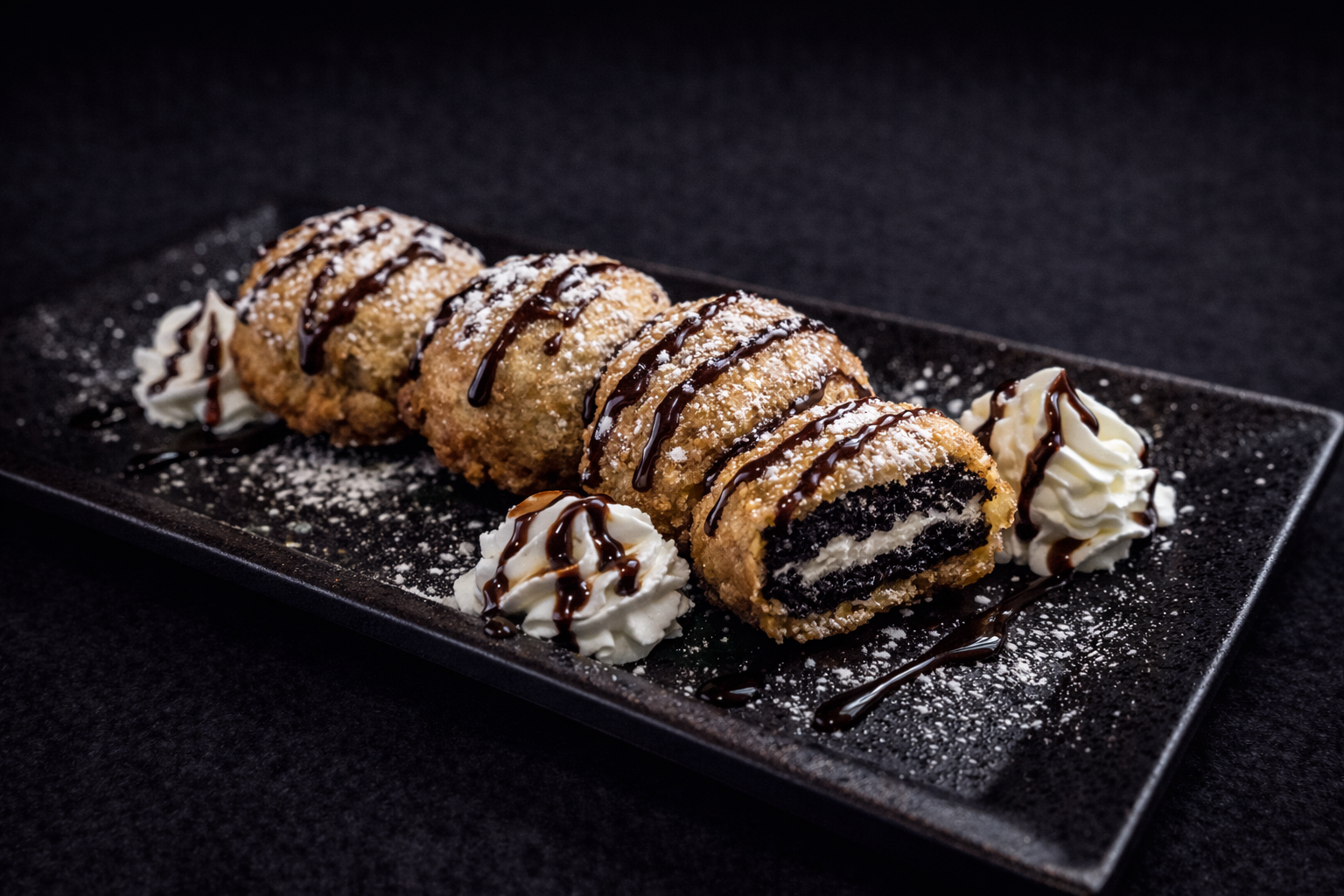Fried Oreo cookies with whipped cream and chocolate sauce at Kuchi buffet, a Sushi restaurant in Tampa