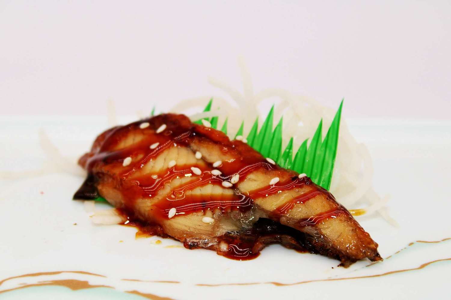 Grilled eel fillet with teriyaki sauce and sesame seeds at Kumamon Sushi & Ramen AYCE, a Japanese Restaurant in Wilmington