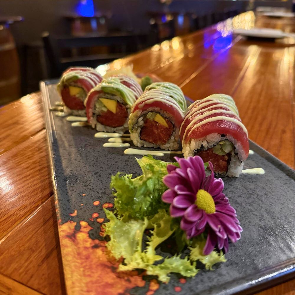 Sushi roll with tuna and mango, drizzled with sauce at Kumo, a Japanese Restaurant in Schererville
