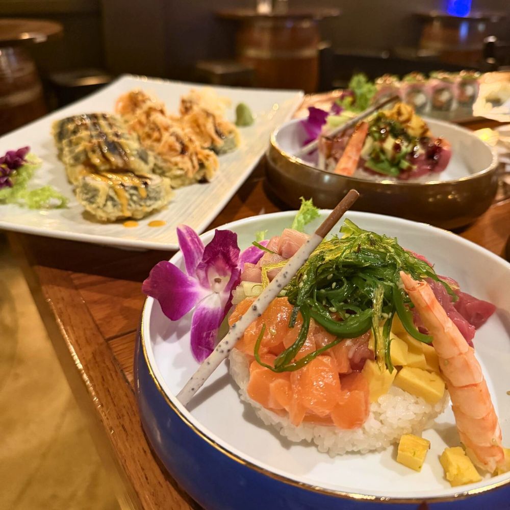 Sushi rolls and a poke bowl with salmon at Kumo, a Japanese Restaurant in Schererville