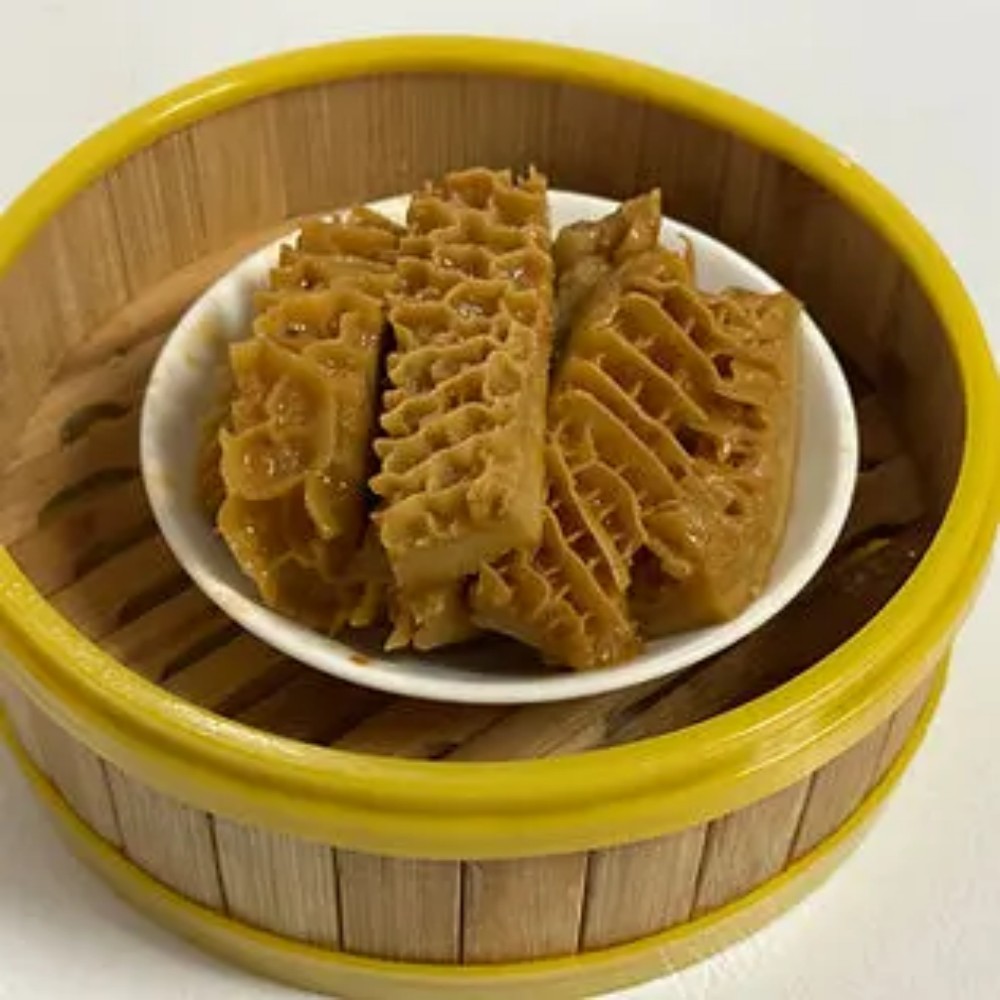 Marinated honeycomb tripe in bamboo steamer