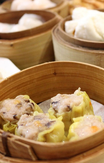 Steamed siu mai dumplings in bamboo steamer at Kungfu Noodles, a Ramen restaurant in Port Hueneme