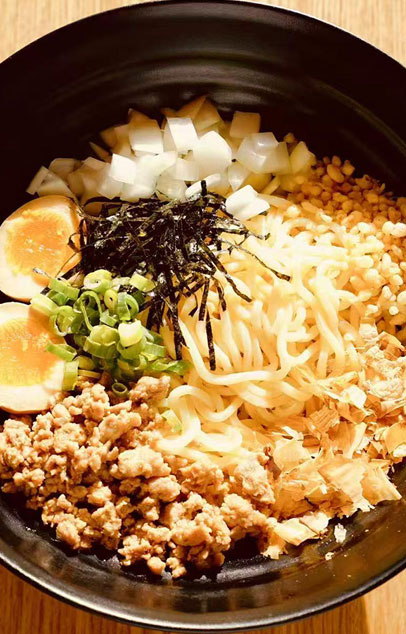 Dry ramen with egg, minced pork, onions, seaweed at Kungfu Noodles, a Ramen restaurant in Port Hueneme