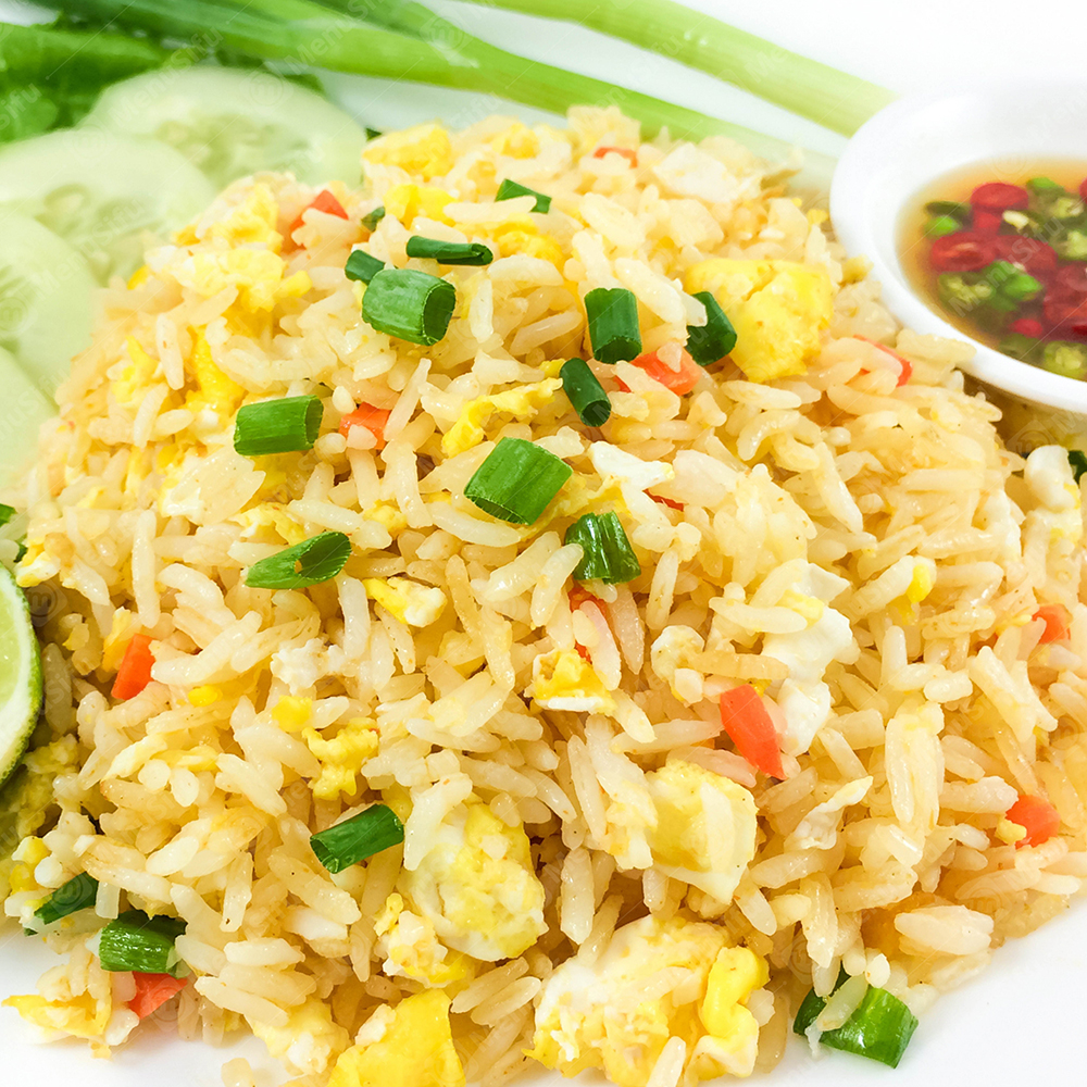 Egg Fried Rice - Flavorful rice fried with egg, scallions, and diced carrots at Kwik Wok, a Chinese Restaurant in Merrick