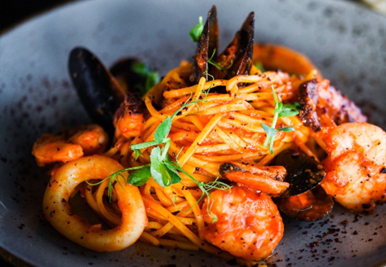 Seafood boil and seafood pasta served at Lee’s Seafood Boil, a seafood restaurant in Solon.