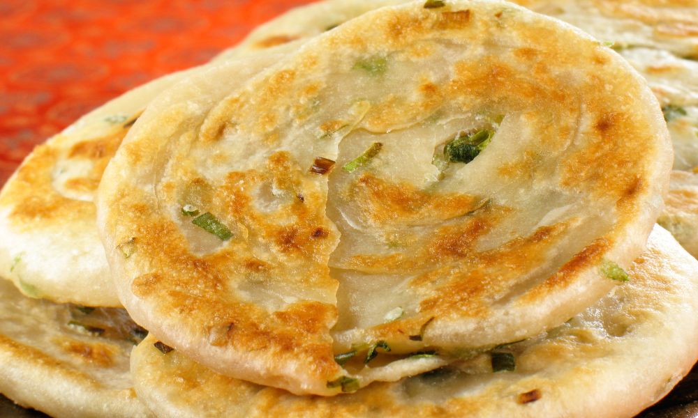 Flaky scallion pancakes with golden-brown crispy crusts at Legend Asian Fusion, a Asian fusion restaurant in Colonia