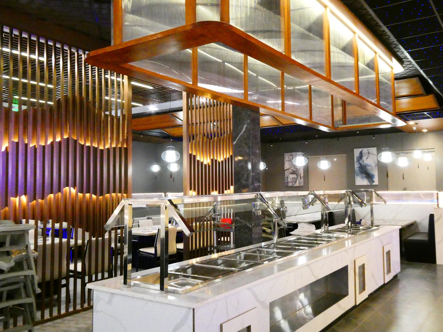 yswx_20251211_a8ba9ac2eafd44bbbfb2d9061abd62e2 3 black buns, a bowl of fried rice, and a plate of dumplings