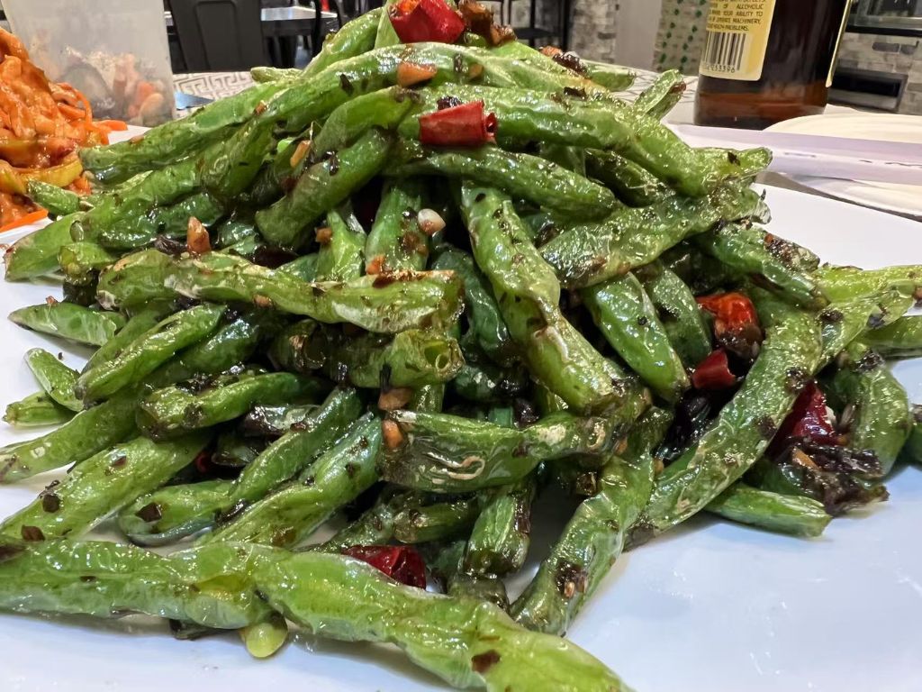 Liao-M-BBQ-Chinese-restaurant-Dry-Fried-French-Beans-Flushing Dry - Fried French Beans - French beans stir - fried with minced ingredients and dried chili at Liao M BBQ, a Chinese restaurant in Flushing