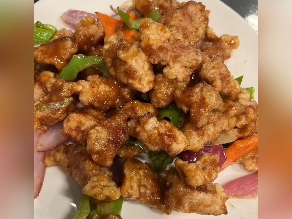 Liao-M-BBQ-Chinese-restaurant-Sweet-and-Sour-Pork-Flushing Sweet and Sour Pork - Crispy fried pork pieces with sweet - and - sour sauce and vegetables at Liao M BBQ, a Chinese restaurant in Flushing