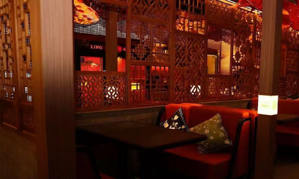Private dining booth with wooden partition at Ling Long, a Asian Restaurant in Oklahoma City