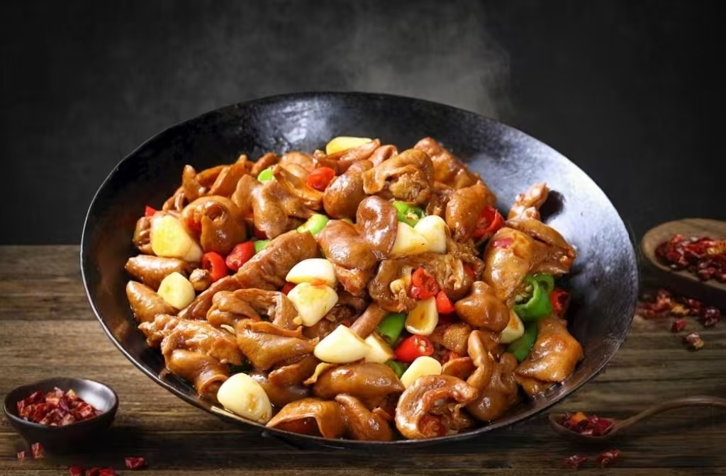 Dry Pot Pig Intestine - Pig intestines stir - fry with garlic & peppers at Live Frog - Sezchuan Grilled Fish & Frog, a Chinese Restaurant in Flushing