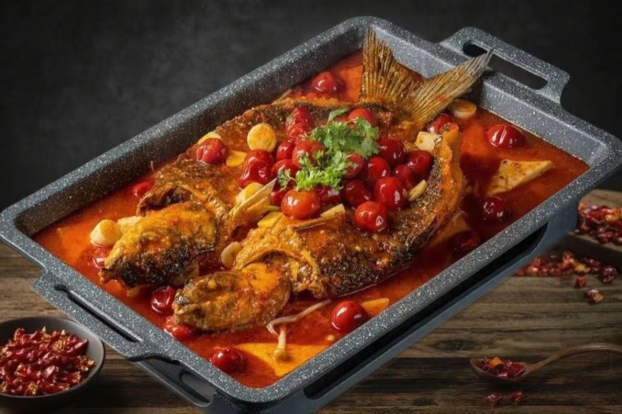 Tomato Grilled Fish - Whole grilled fish in tomato - spicy sauce with cherries at Live Frog - Sezchuan Grilled Fish & Frog, a Chinese Restaurant in Flushing