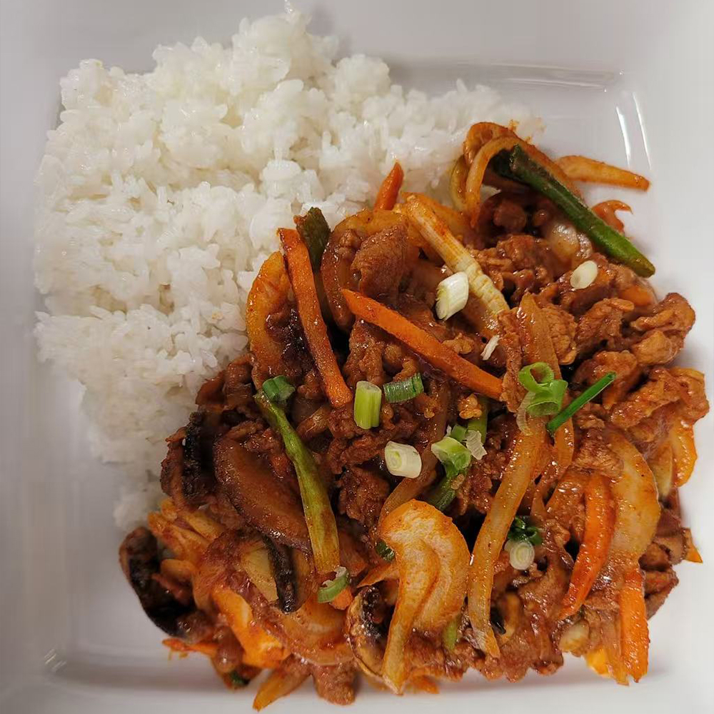 Spicy pork with rice at Lotte Bunsik, a Korean restaurant in Edison.