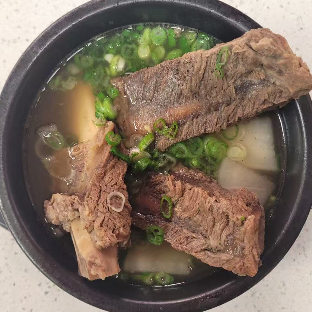 Beef rib soup served at Lotte Bunsik, a casual Korean restaurant in Edison.