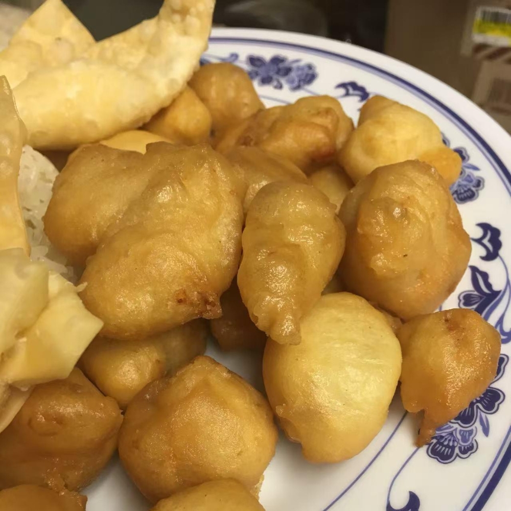 Sweet and sour fried chicken pieces served with rice at Louis's Hawaiian BBQ, a Hawaiian Restaurant in Azusa