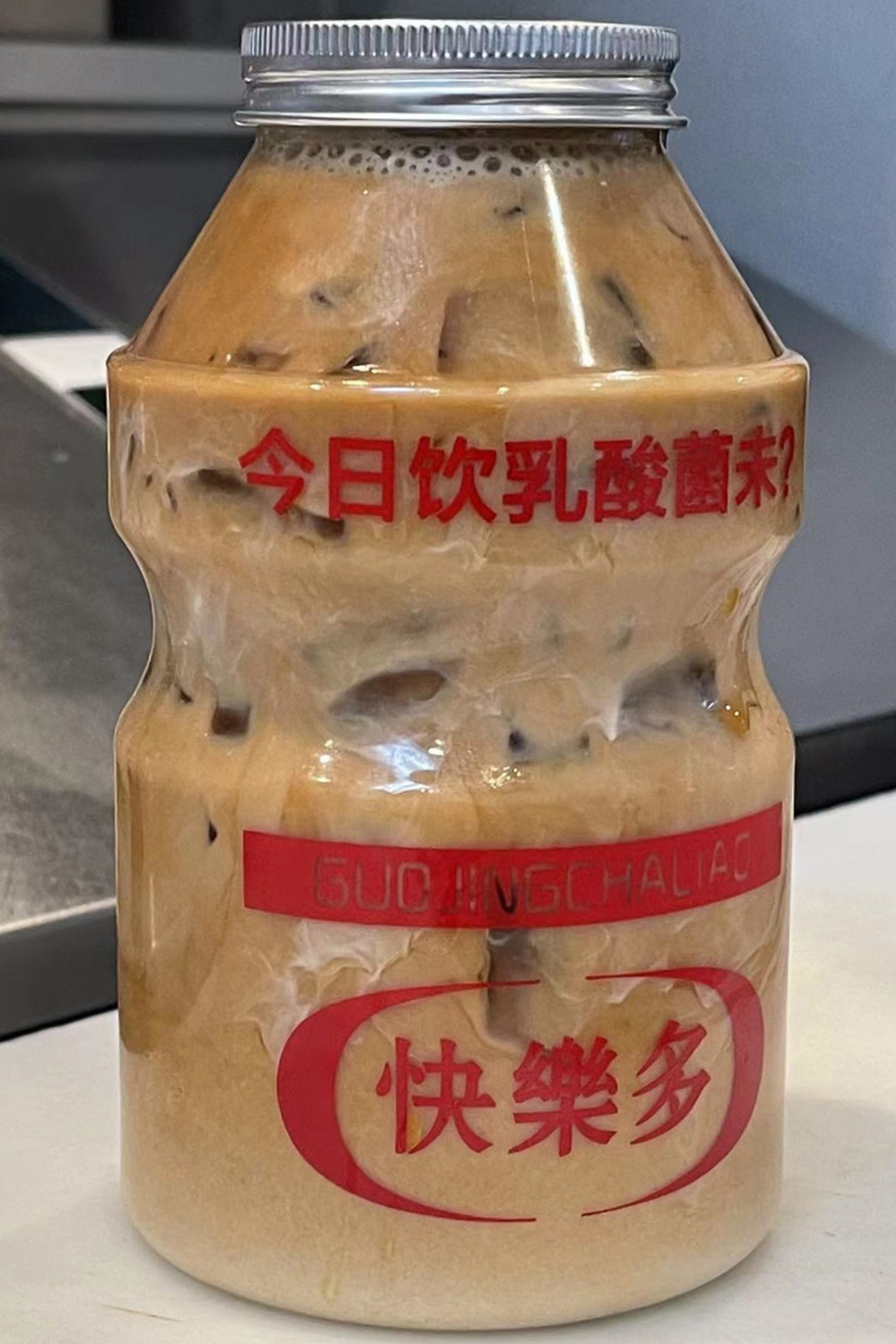 Novelty bottle milk tea with jelly inside at Tea Box Cafe, a Bubble Tea Store in Lancaster