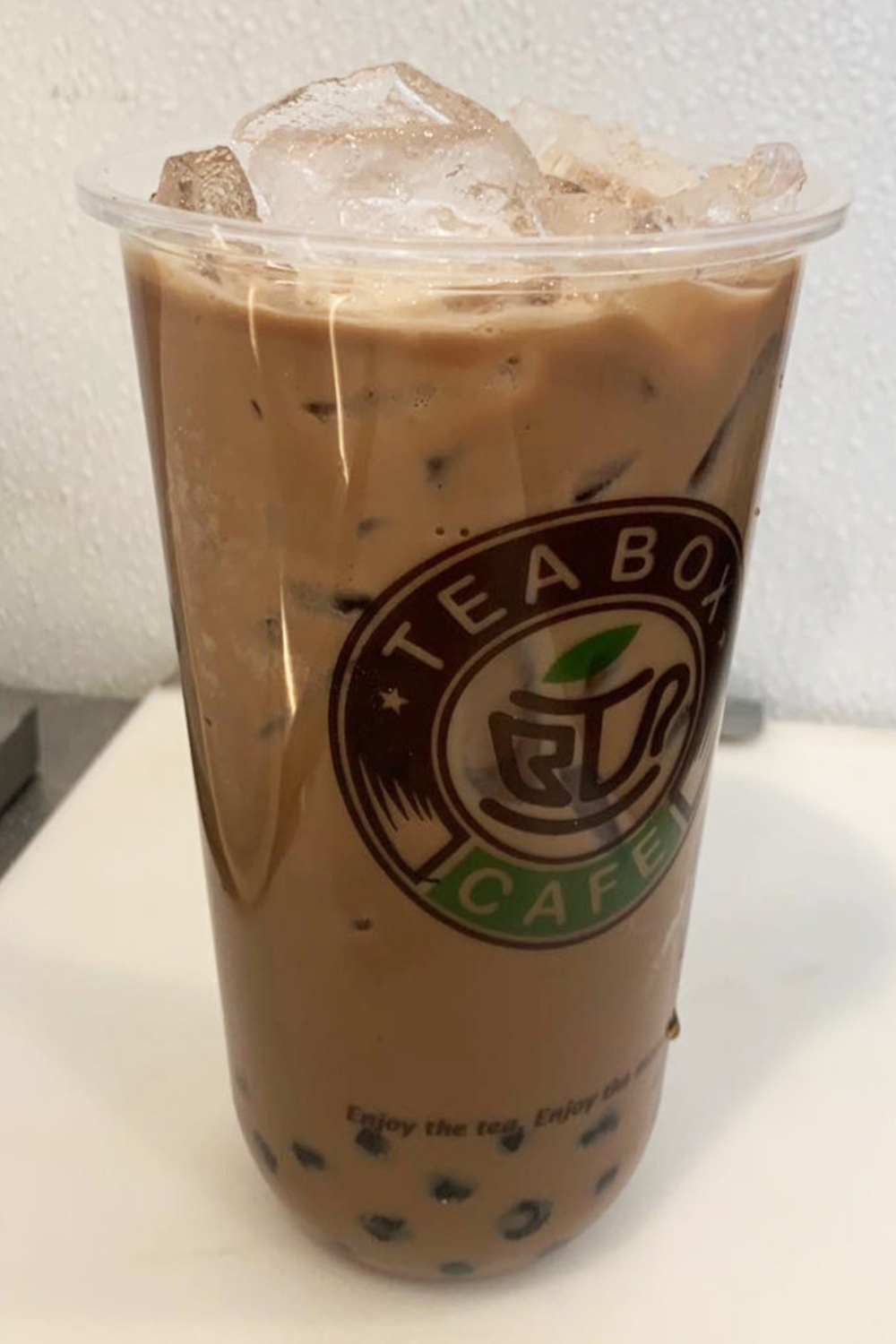 Rich milky bubble tea filled with ice and tapioca pearls at Tea Box Cafe, a Bubble Tea Store in Lancaster
