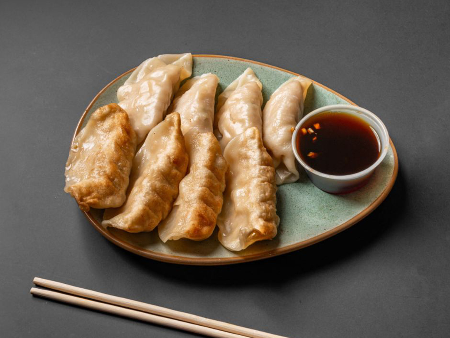 Fried dumplings with dipping sauce from Lucky Dragon Restaurant, a Chinese restaurant in New York