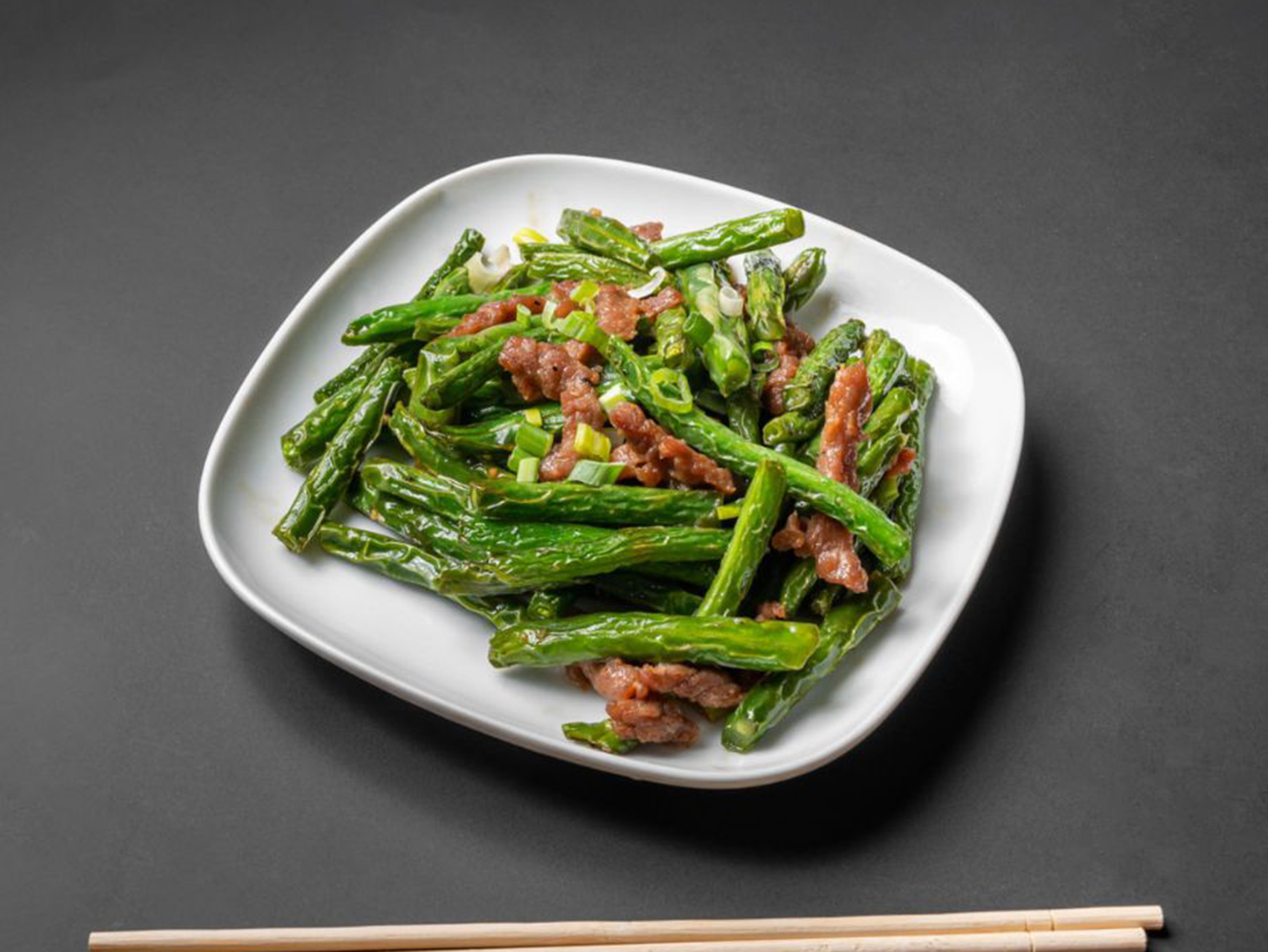 Stir-fried green beans with tender sliced pork at Lucky Dragon, a Chinese Restaurant in New York
