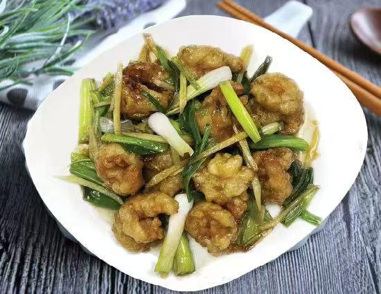 Crispy chicken stir-fried with scallions in savory sauce at Lucky Garden, a Chinese Restaurant in Methuen